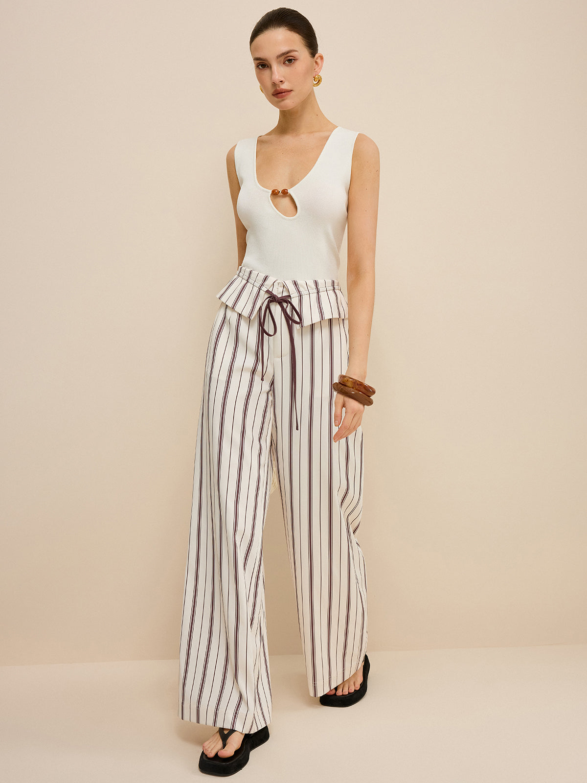 Striped Wide-Leg Pants with Peplum Waist and High Waistband