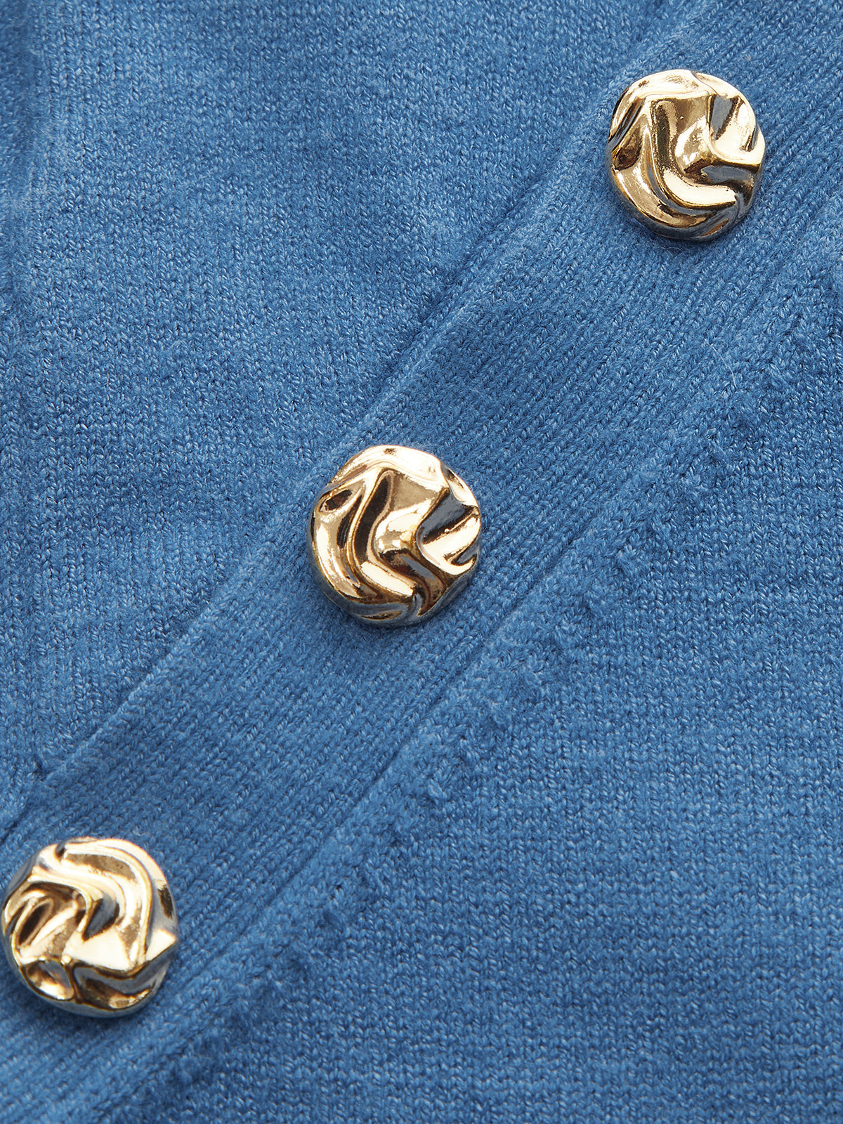 Asymmetrical Metal Button Knit Top with Long Sleeves and Casual Fit