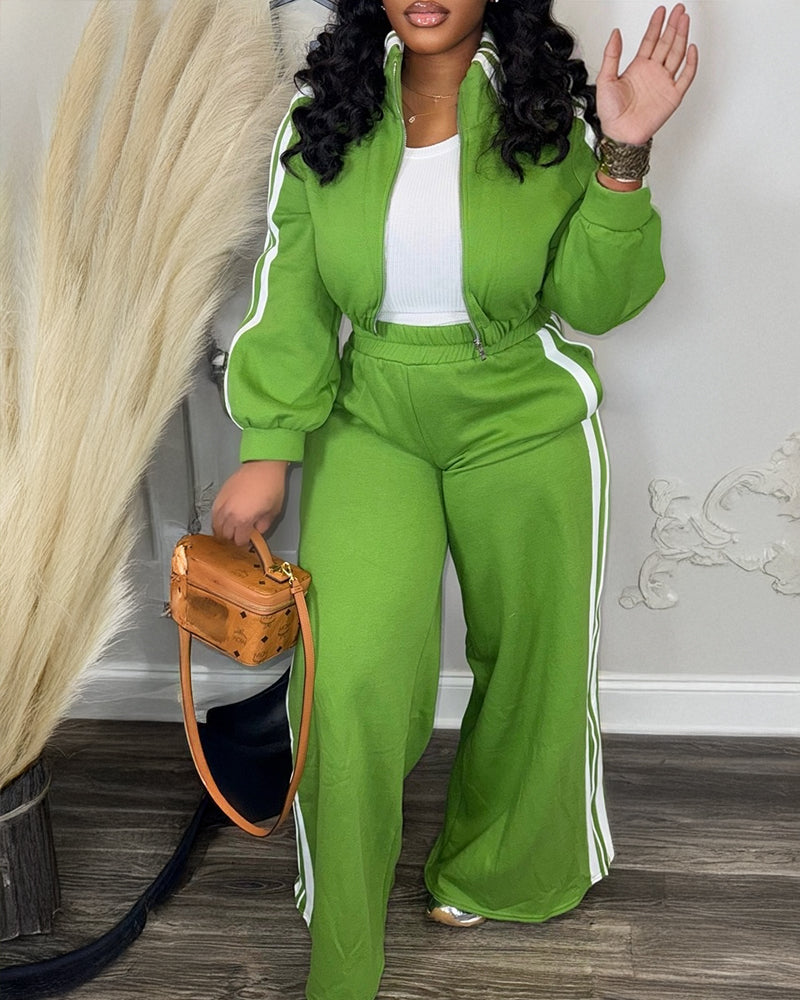 Bright green zip crop jacket and wide-leg pants two-piece ensemble.