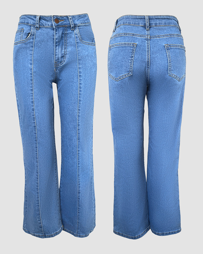 Light blue high waist straight leg jeans with front seams, wide legs, and patch pockets.