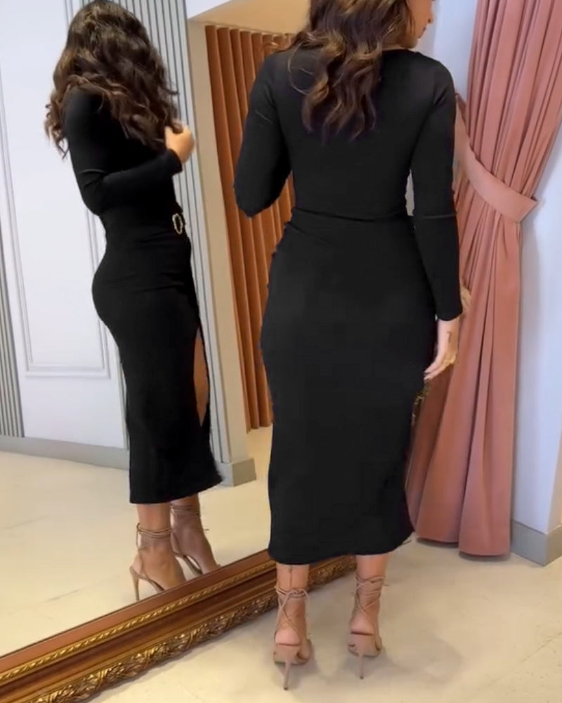 ribbed wrap dress with cinched waist and mid-length ring detail.