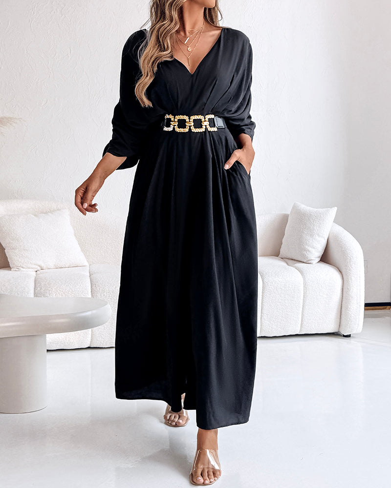  Deep V-Neck Jumpsuit with ruched sleeves and waist ties.