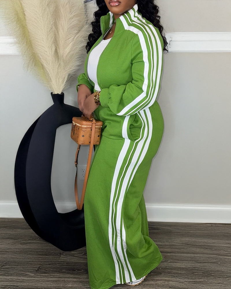 The  green zip crop jacket and wide-leg pants over a white top.