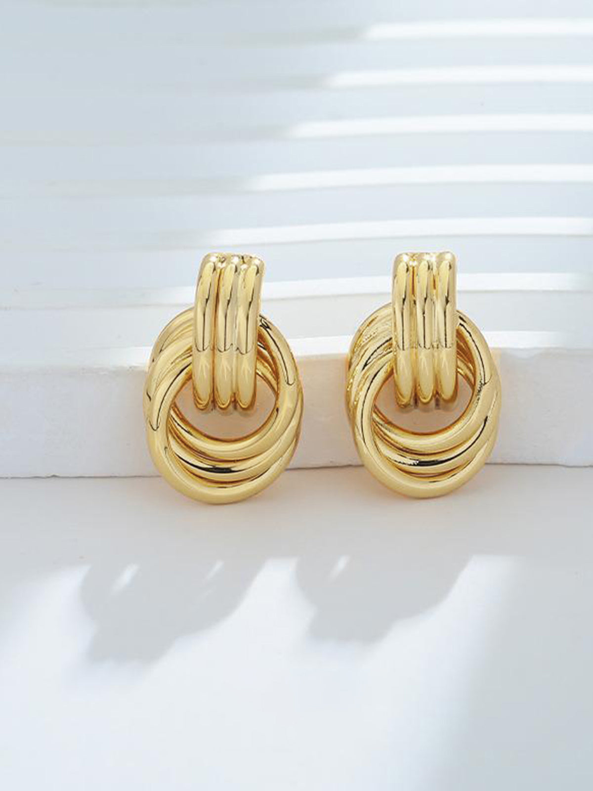 Gold Tone Multi Ring Drop Earrings with Elegant Long Dangles