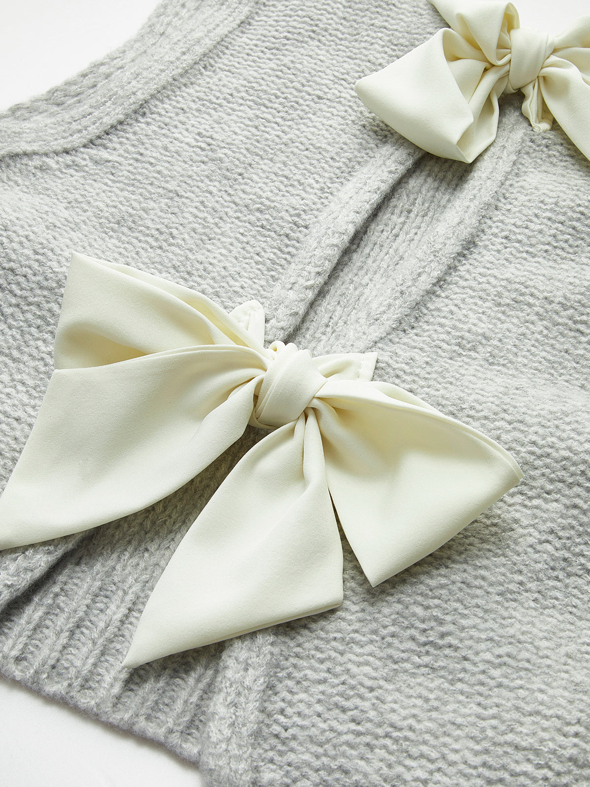 Bow Front Sweater Vest for Layering and Casual Wear