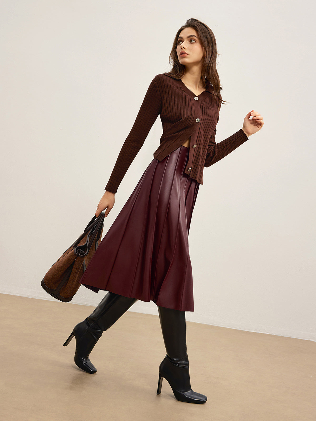 "Faux Leather Pleated Midi Skirt with Elastic Waistband"