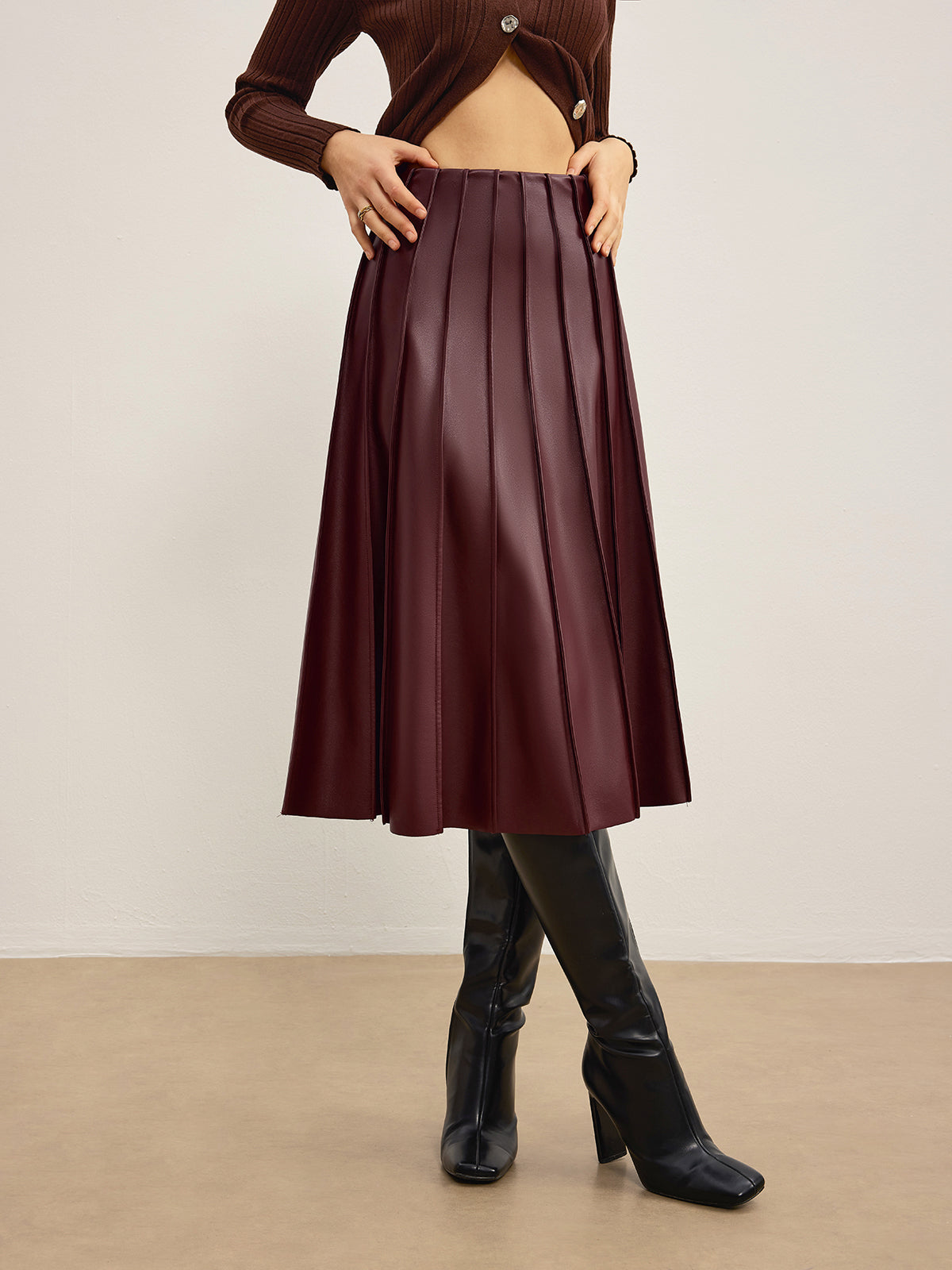 "Faux Leather Pleated Midi Skirt with Elastic Waistband"