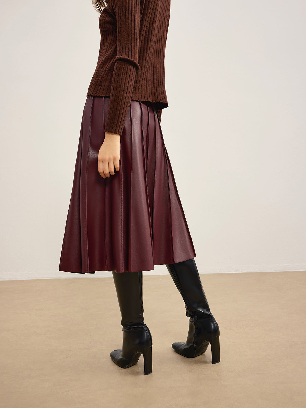"Faux Leather Pleated Midi Skirt with Elastic Waistband"