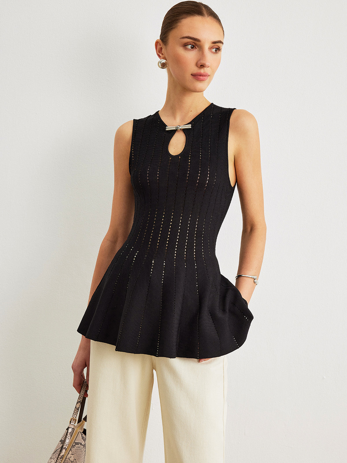 Semi-Sheer Knit Peplum Top with Bow Detail and Ruffled Sleeves