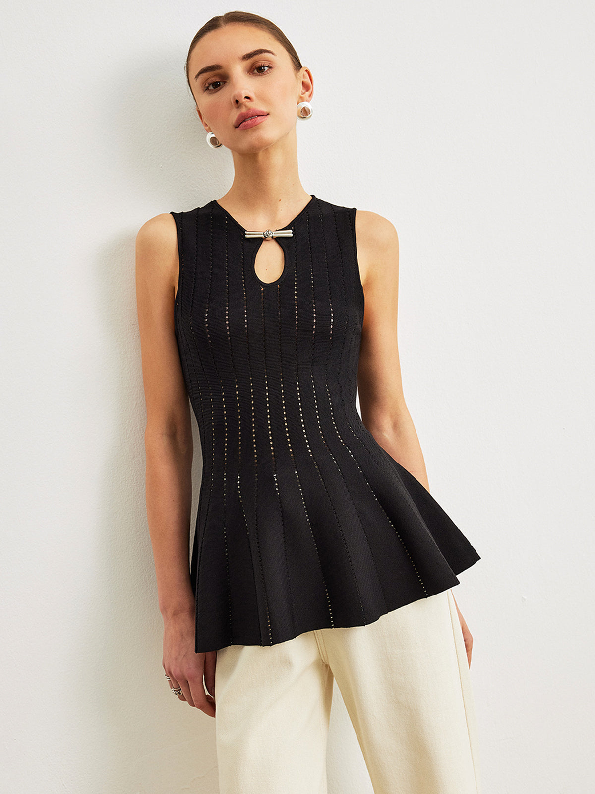Semi-Sheer Knit Peplum Top with Bow Detail and Ruffled Sleeves