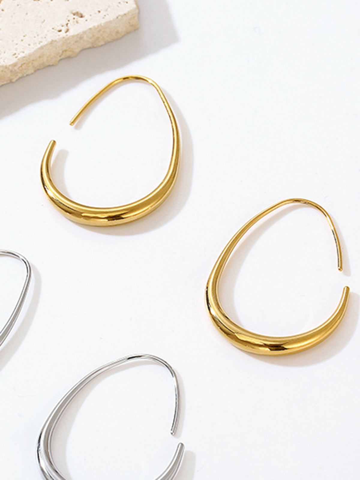 Golden Fluid Hoop Earrings with Elegant Drop Design