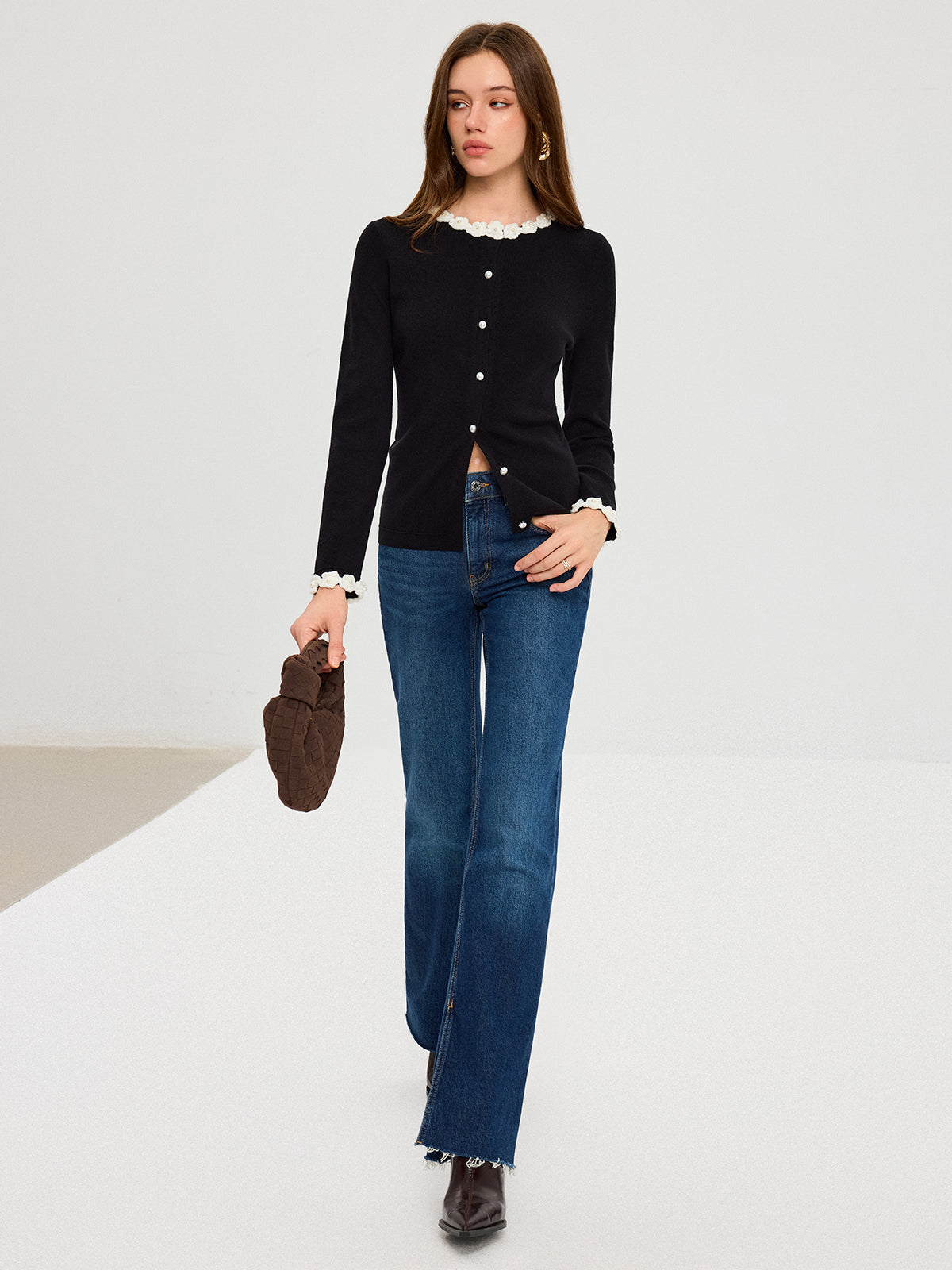 KOAD'CLO 3D Floral Embroidered Cardigan with pearl buttons, blue jeans, brown ankle boots.