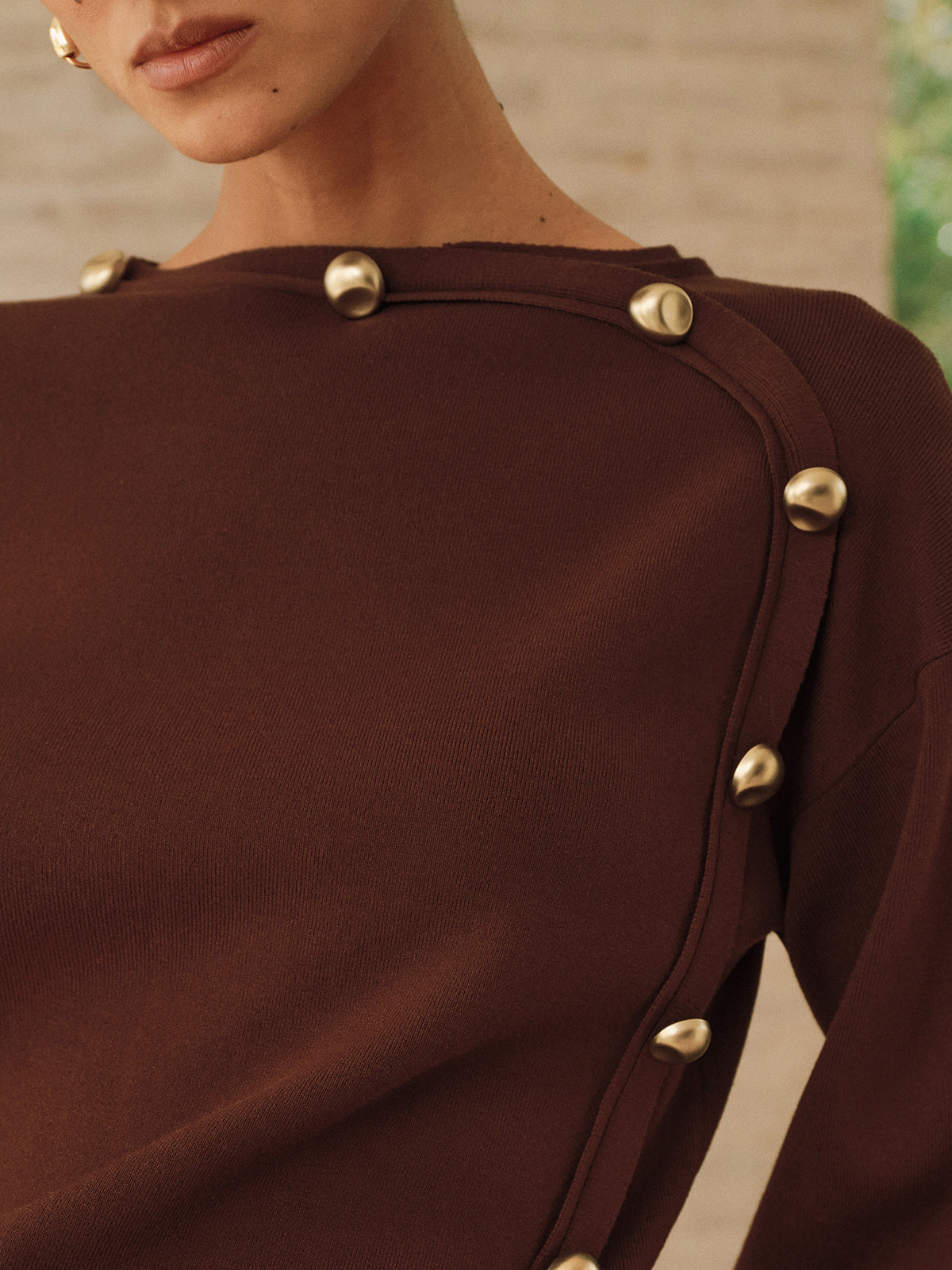 Asymmetric Metal Detail Sweater with Elegant Ribbed Trim