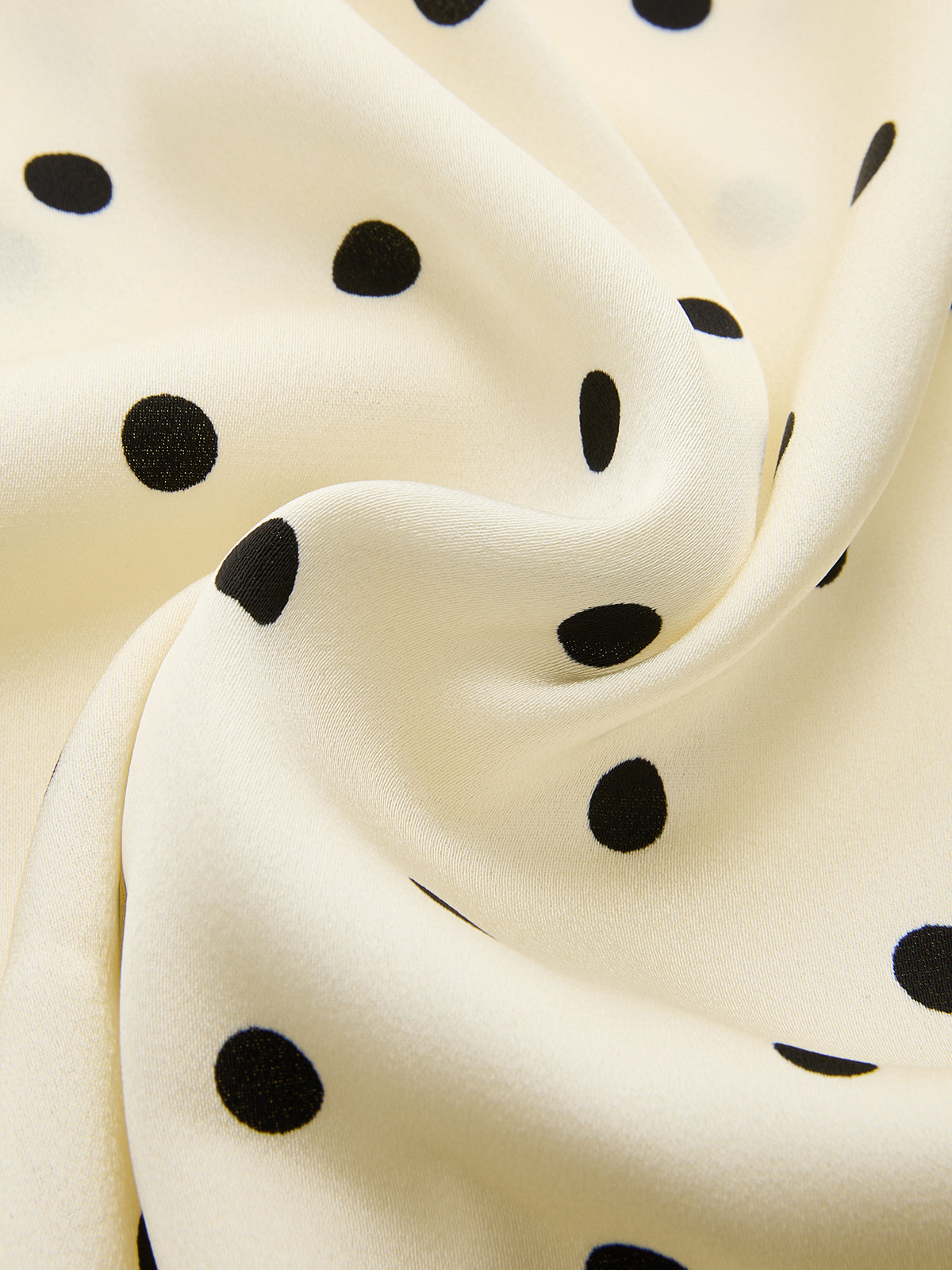 Polka Dot Sleeveless Ruched Blouse with Tie-Back Detail