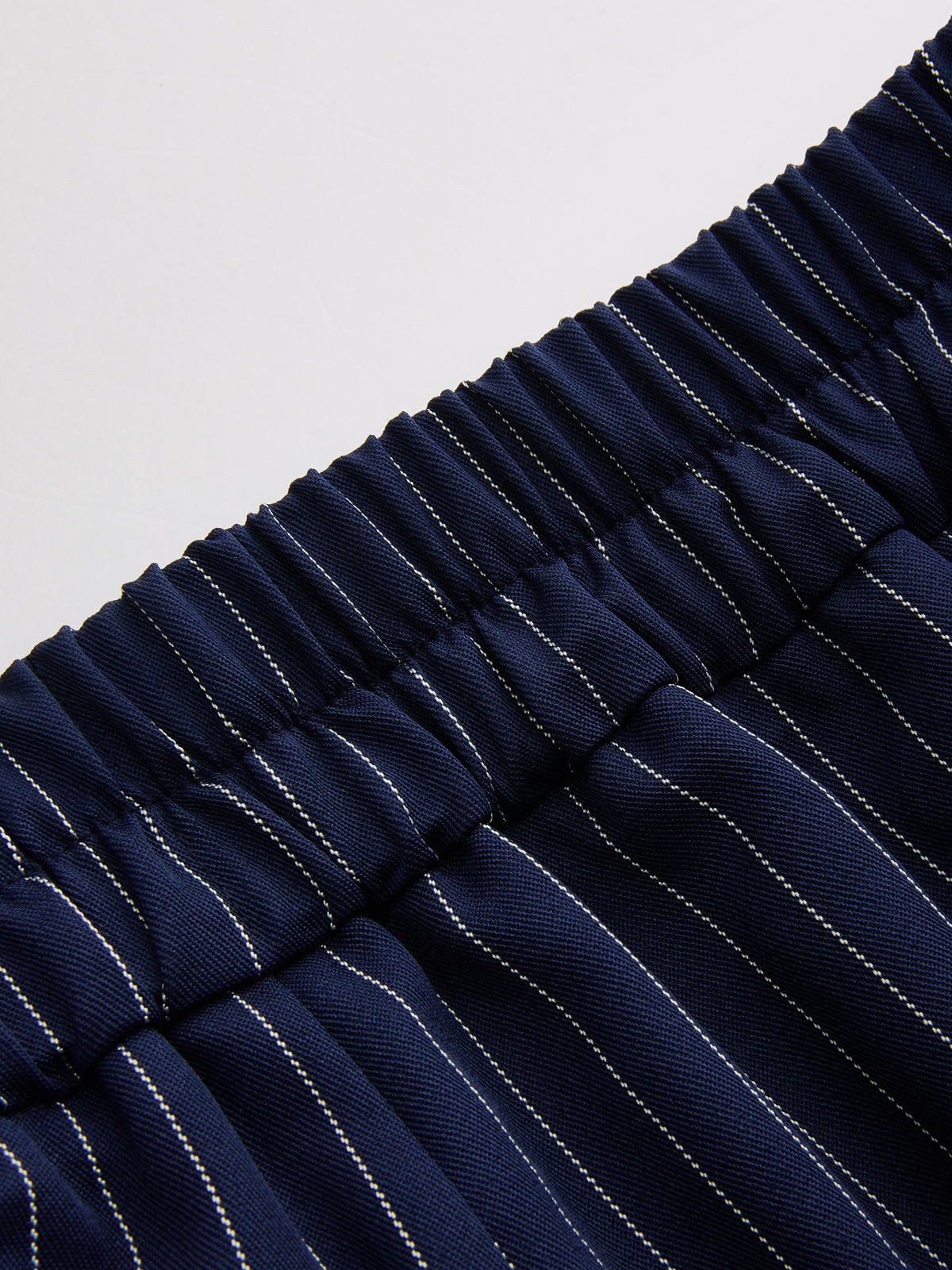 Asymmetric Pinstripe Top & Pleated Pants Set with Matching Belt